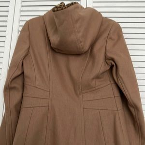 Never worn and climb wool blend hooded car coat. Animal print inside hood.